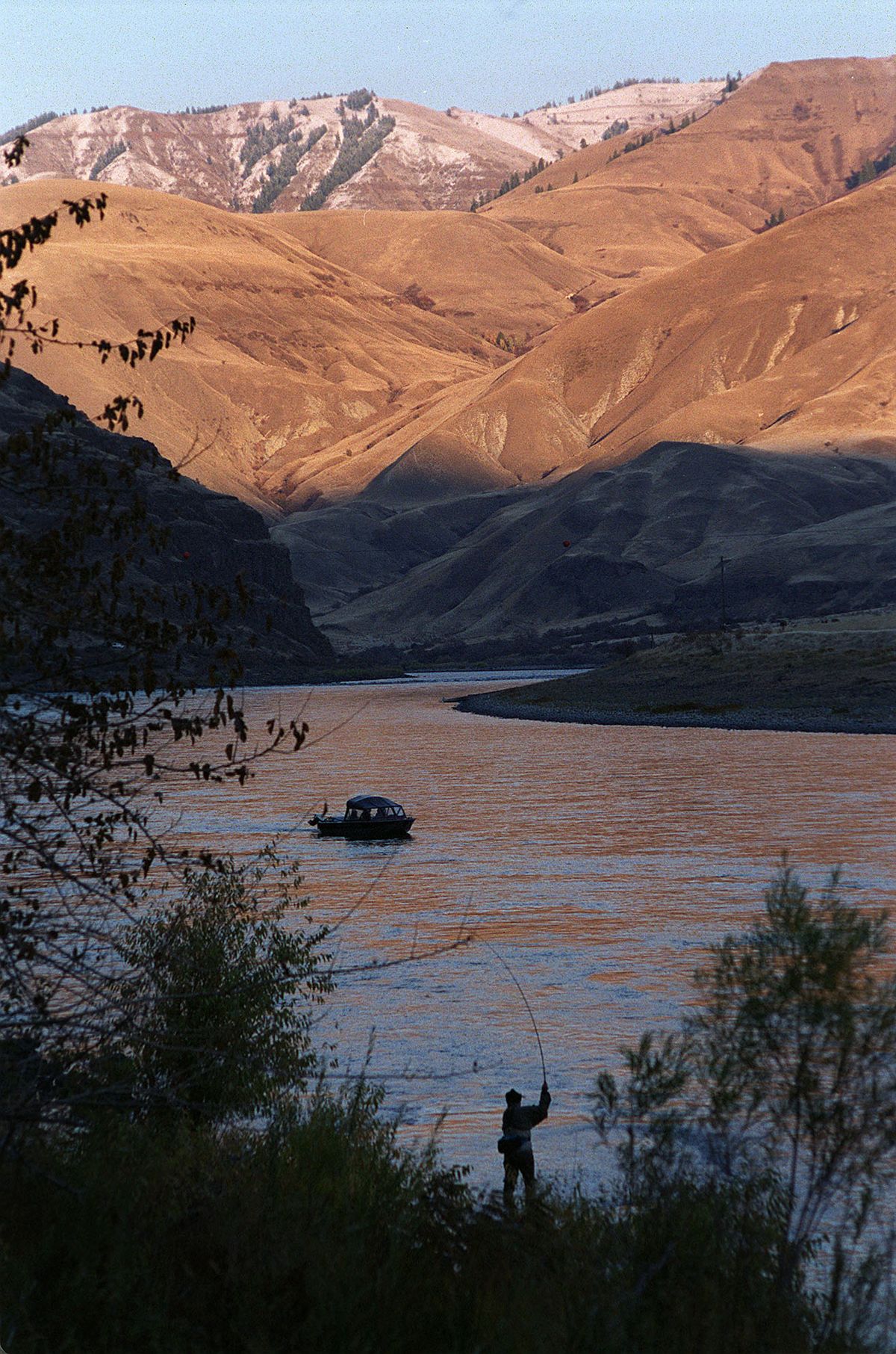Steelhead attract a variety of anglers to the Snake River. (File / The Spokesman-Review)