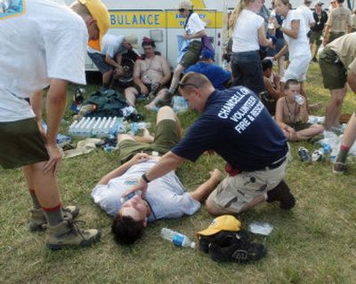 
Boy Scouts are treated for heat-related symptoms during the National Boy Scout Jamboree on Wednesday at Fort A.P. Hill near Bowling Green, Va. 
 (Associated Press / The Spokesman-Review)