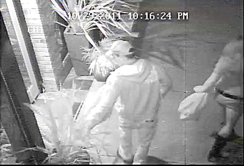 A vandal caught o tape in Coeur d'Alene is now the target of a Crime Stoppers reward.
Surveillance video shows the man grabs flowers in large pots in front of a home decor store at 513 E. Sherman Ave., then tug on the flowers until the pots fell over and shattered.
The vandal's female companion is seen laughing at the damages.
Anyone with information on their identities is asked to call Crime Stoppers at 1-800-222-TIPS or submit tips <a href=