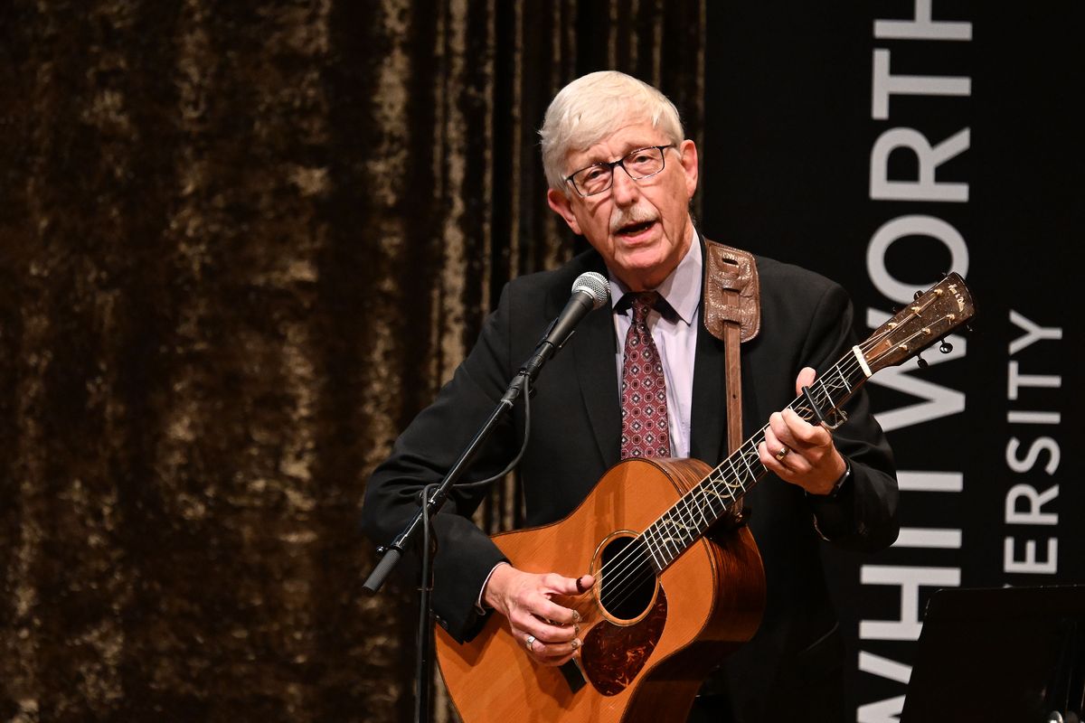 During the Whitworth University President’s Leadership Forum, renowned geneticist Francis S. Collins, M.D., Ph.D., former director of the National Institutes of Health (NIH), surprises the audience by singing a song titled “Praise the Source of Faith and Learning”, Thursday. (COLIN MULVANY /THE SPOKESMAN-REVIEW)