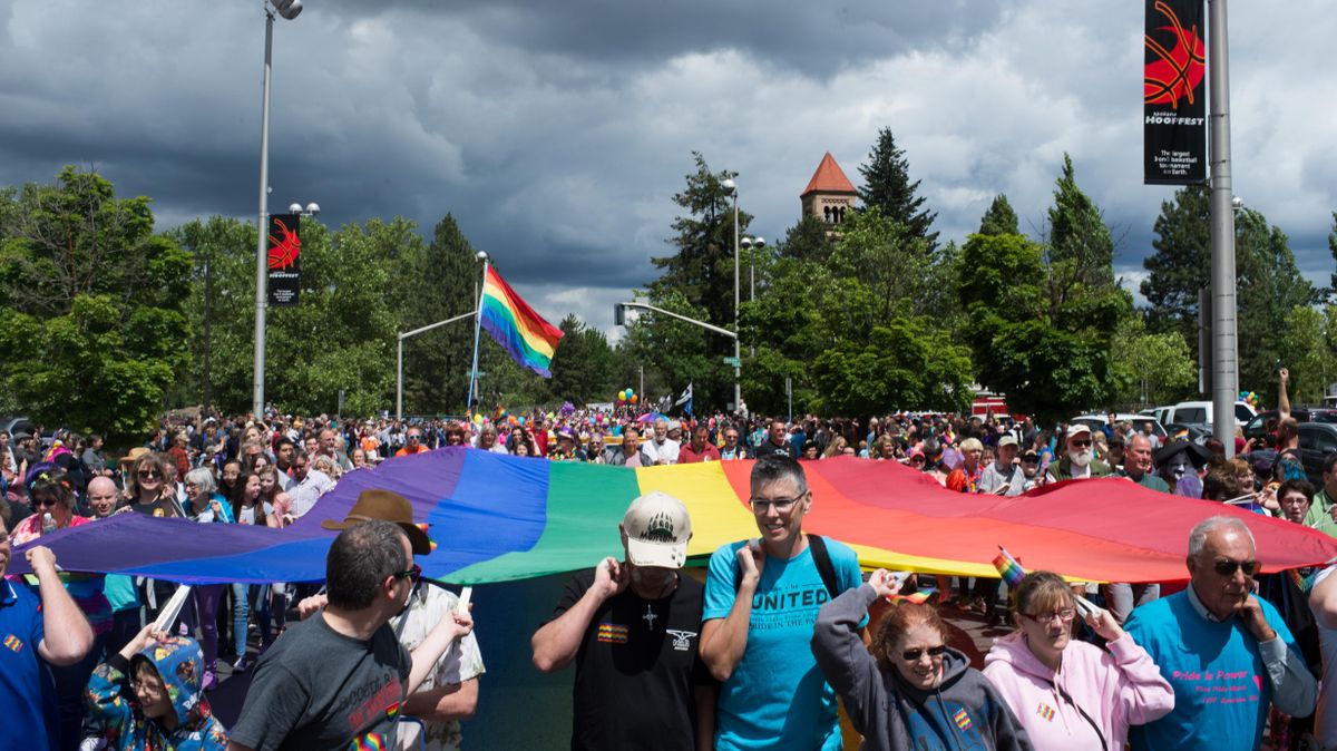 A giant pride flag makes its way through downtown during the 2017 Pride Parade on Saturday, June 10, 2017, in Spokane, Wash. (Tyler Tjomsland / The Spokesman-Review)