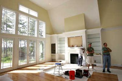 
Living rooms that are more for show than leisure, for instance, can be a good place to start downsizing.  Ridding yourself of excess furniture will do a great deal in lessening your moving load.
 (AP / The Spokesman-Review)