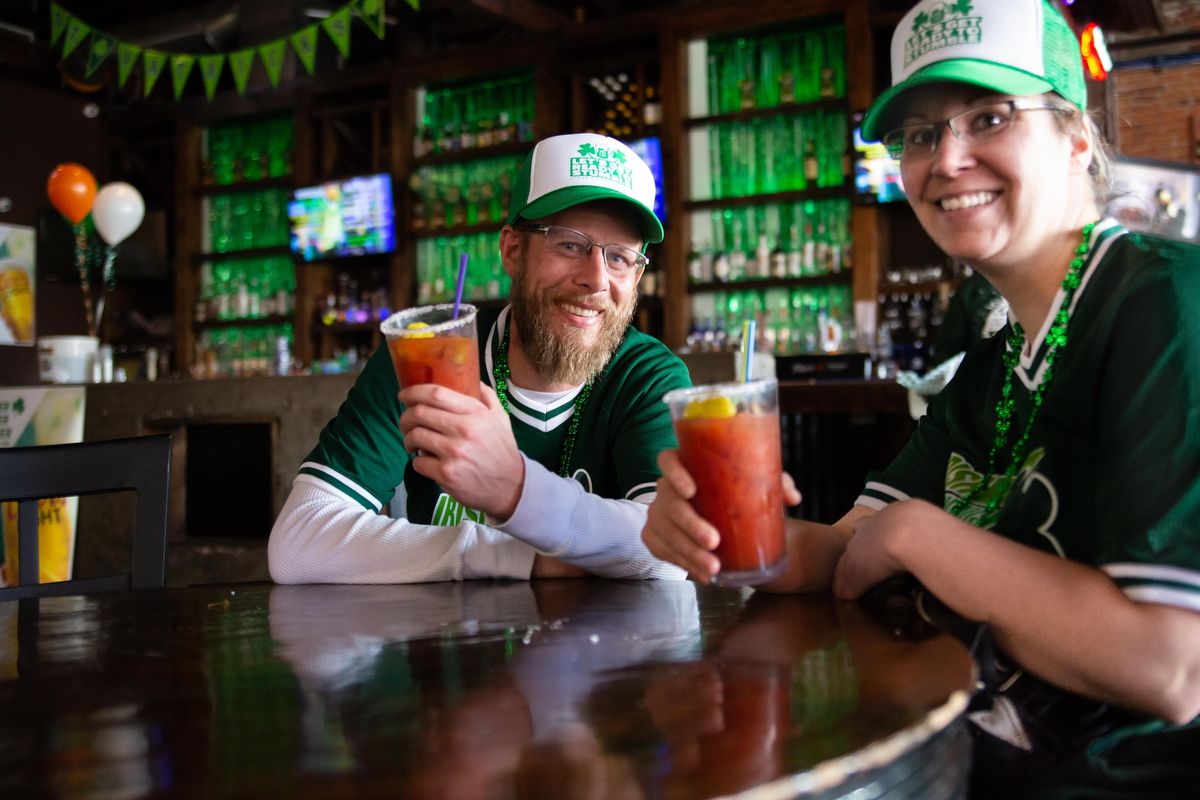 Aaron Rink, 38, and Tera Layton, 34, of Yakima, hoist bloody marys during the 2019 Hangover Brunch hosted by the Irish Drinking Team at nYne Bar and Bistro in Spokane, Wash., on Sunday, March 17. The Irish Drinking Team’s St. Patrick’s Day pub crawl began at nYne at 7 a.m. the day before and had a slew of downtown Spokane stops and over 700 tickets sold, and the Hangover Brunch allowed attendees to recover with breakfast burritos, croissants and biscuits with gravy. (Libby Kamrowski / The Spokesman-Review)