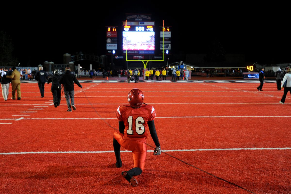 Vernon Adams stares at the scoreboard after EWU lost to Sam Houston State despite a desperate second-half rally in which he came off the bench to throw six TD passes. (Tyler Tjomsland)