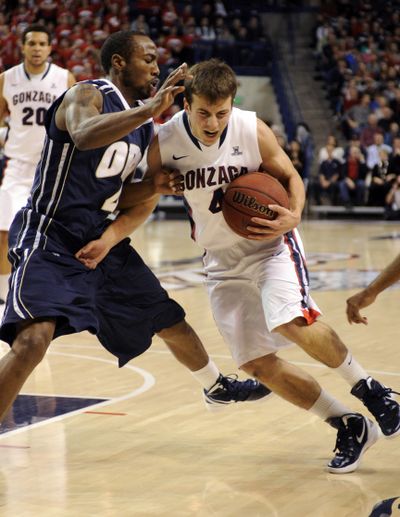 Oral Robert's guard Roderick Pearson Jr.,left, defends against Gonzaga guard Kevin Pangos during the first half of their NCAA college basketball game Thursday, Dec. 15, 2011, at the McCarthey Athletic Center in Spokane, Wash. (Colin Mulvany / Spokesman-Review)