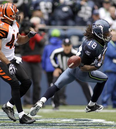 When usually sure-handed receivers like Sidney Rice (18) can’t haul in passes in the end zone it adds to the mounting frustrations of the offensively inept Seahawks. (Associated Press)