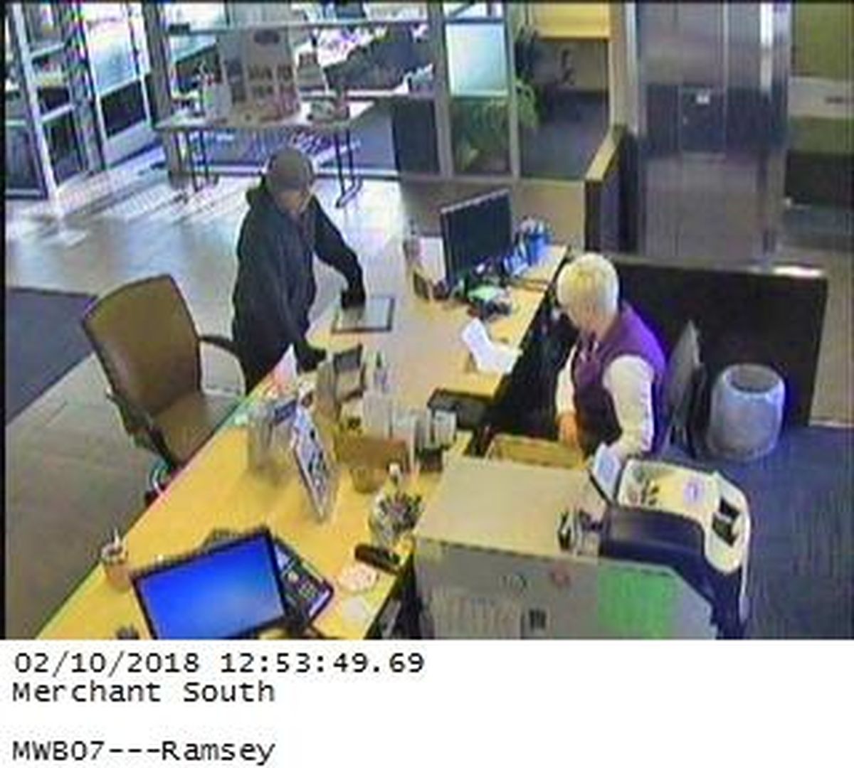 Security footage shows a man suspected of robbing a bank Saturday. (Coeur d’Alene Police Department)