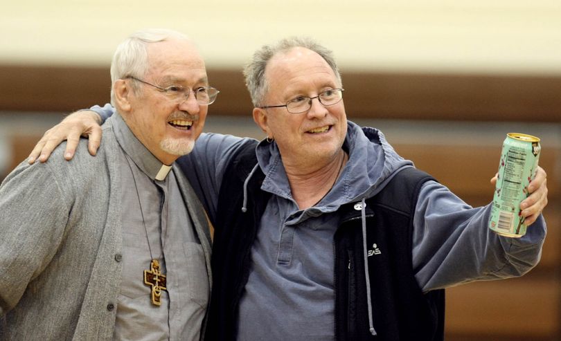 Bill Ayers, right, embraces his former family pastor Dr. D. Curtis Minter of Loveland, Colo. prior to Ayer�s speech at the University of Wyoming Wednesday April 28, 2010 in Laramie, Wyo. Ayers pursued a court order allowing him to speak at the University of Wyoming after initially being denied. (Andy Carpenean / Laramie Boomerang)