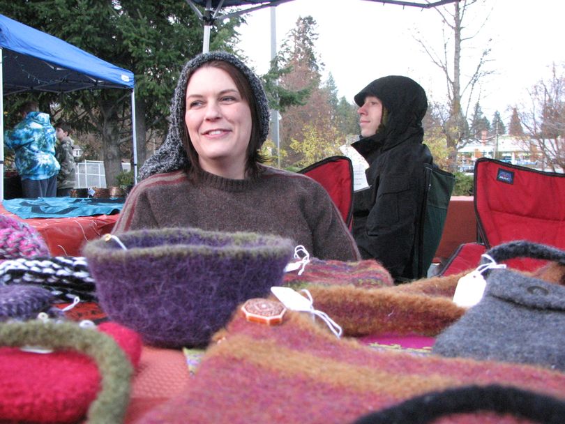 Samantha McDonald of Strange Magic Moments is a little chilly on her first day at the South Perry Farmers' Market on Nov. 11, 2010 (Pia Hallenberg)