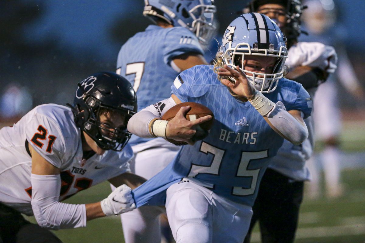 Central Valley’s Zac Abshire ran for 78 yards in Friday’s 21-0 home win over Lewis and Clark.  (Cheryl Nichols/For The Spokesman-Review)