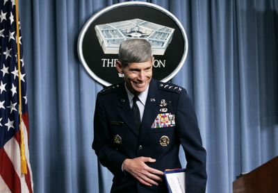 Air Force Chief of Staff Gen. Norton Schwartz grins following a reporter’s comment during a news conference Tuesday.  (Associated Press / The Spokesman-Review)
