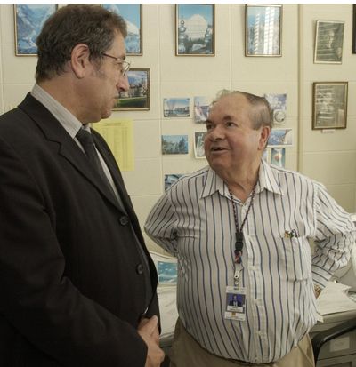 Nobel Prize winner for physics Alexei Abrikosov, right, talks with fellow researcher Valerii Vinokour in Abrikosov’s office at the Argonne National Laboratory in Argonne Ill. Tuesday, Oct. 7, 2003. (Stephen J Carrera / Associated Press)