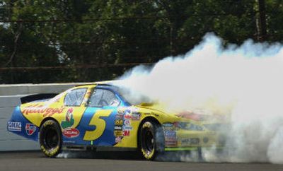 
 Nextel Cup driver Kyle Busch crashes his car into the wall on the second turn during a practice session for the Pennsylvania 500 at the Pocono Raceway Friday.
 (Associated Press / The Spokesman-Review)