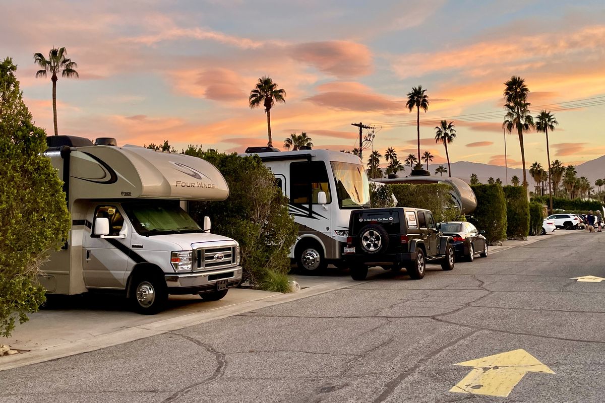 The sun sets over the Happy Traveler RV Park in Palm Springs. (Leslie Kelly)