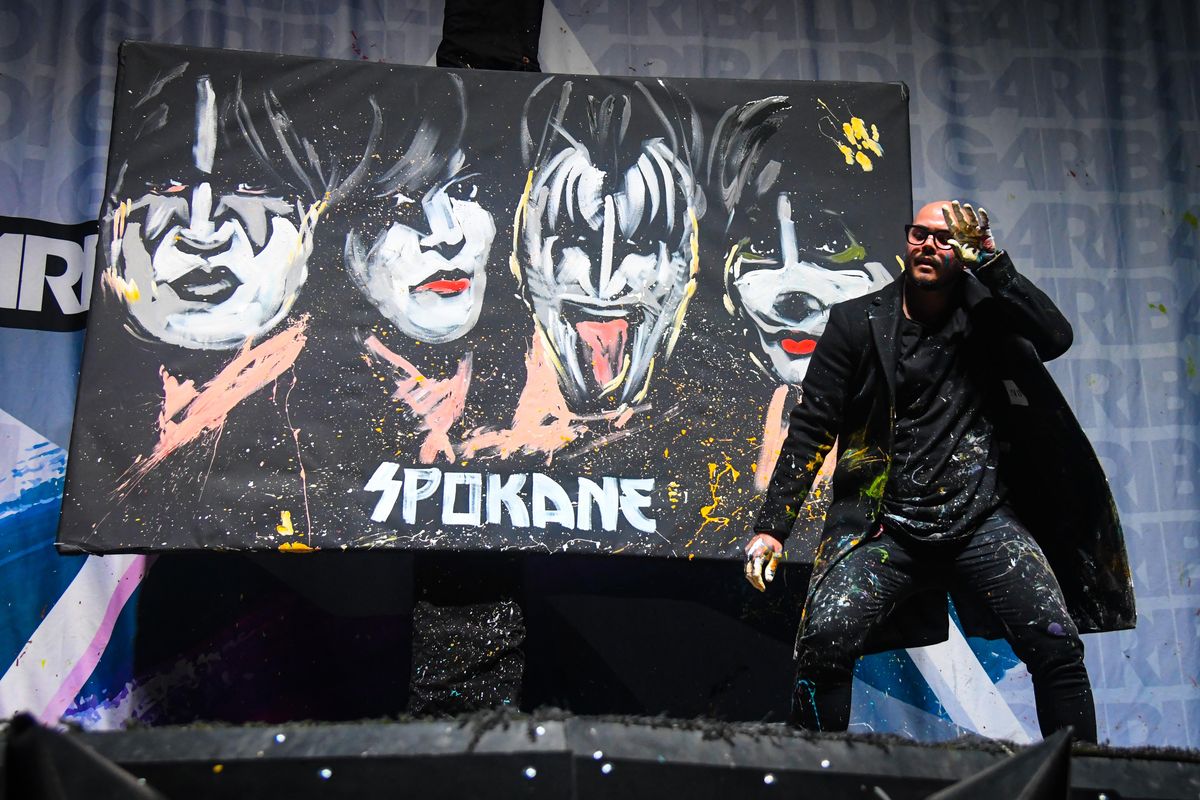 Performance painter David Garibaldi creates a portrait of the Kiss members for the crowd before the Kiss concert, Monday, Feb. 4, 2019, in the Spokane Arena. Dan Pelle/THE SPOKESMAN-REVIEW (Dan Pelle / The Spokesman-Review)