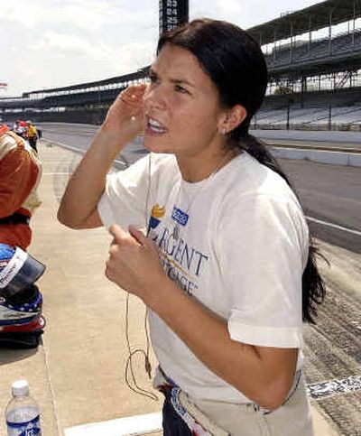 
Driver Danica Patrick  put in her ear plugs as she prepared to practice at the Indianapolis Motor Speedway on Wednesday. 
 (Associated Press / The Spokesman-Review)