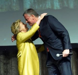 New York City Mayor Bill de Blasio, right, and presidential candidate Hillary Clinton, left, perform at the 94th annual Inner Circle Dinner at the New York Hilton Hotel in Manhattan on Saturday, April 9, 2016. New York City political reporters lampooned presidential candidates, the Mayor and Gov. Andrew Cuomo during the show. The Inner Circle donates a portion of the proceeds from the gala dinner-show to some 100 New York charities. (David Handschuh/The Inner Circle Via AP)