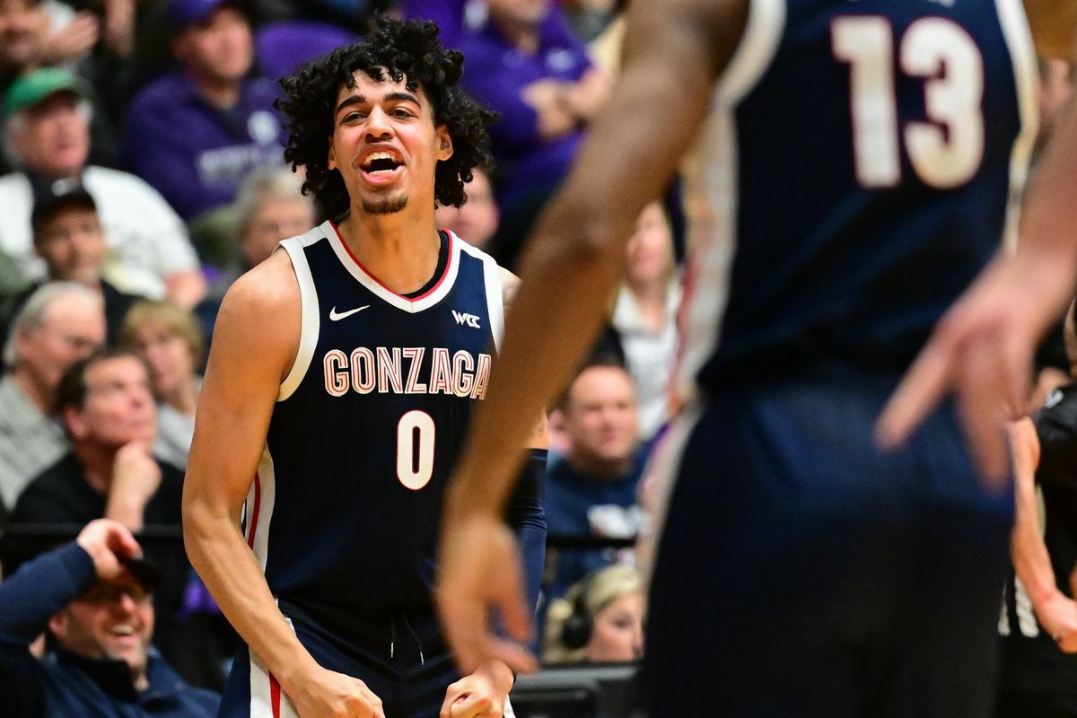 Gonzaga’s Julian Strawther reacts after hitting one of his eight 3-pointers against Portland during Saturday’s 82-67 West Coast Conference win at the Chiles Center in Portland.  (Tyler Tjomsland/The Spokesman-Review)