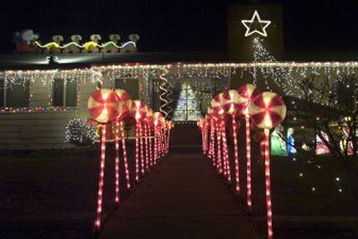 
Holiday lights and props make this house on South McDonald Road stand out.
 (Holly Pickett / The Spokesman-Review)