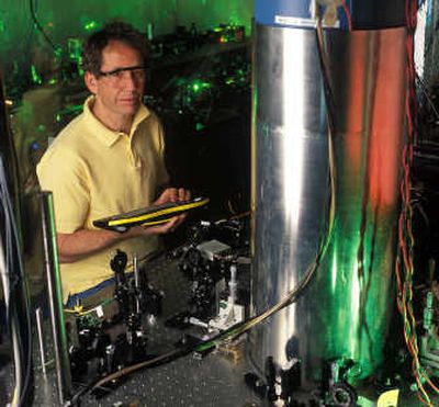 
Jim Bergquist, a physicist at the National Institute of Standards and Technology,  demonstrates the world's most accurate clock. McClatchy-Tribune
 (McClatchy-Tribune / The Spokesman-Review)
