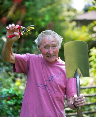 Ciscoe Morris, shown here in 2018 with his favorite clipper and shovel, offers tips for new gardeners ahead of his visit to the Inland Empire Gardener’s Expo on Saturday.  (Mike Siegel/Seattle Times)