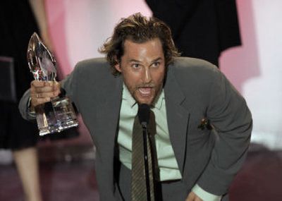 
Matthew McConaughey accepts the award for favorite male action star at Tuesday's 32nd annual People's Choice Awards. 
 (Associated Press / The Spokesman-Review)
