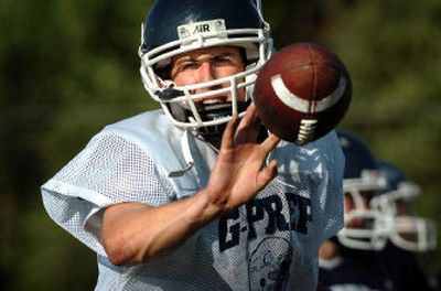 
Gonzaga Prep QB Max Manix lobs a ball to a running back during practice. Last season he was fifth among all GSL rushers and ranked second in total offense.
 (Holly Pickett / The Spokesman-Review)