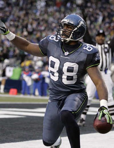 
Marcus Pollard hauled in a three-yard touchdown pass for the Seahawks. Associated Press
 (Associated Press / The Spokesman-Review)