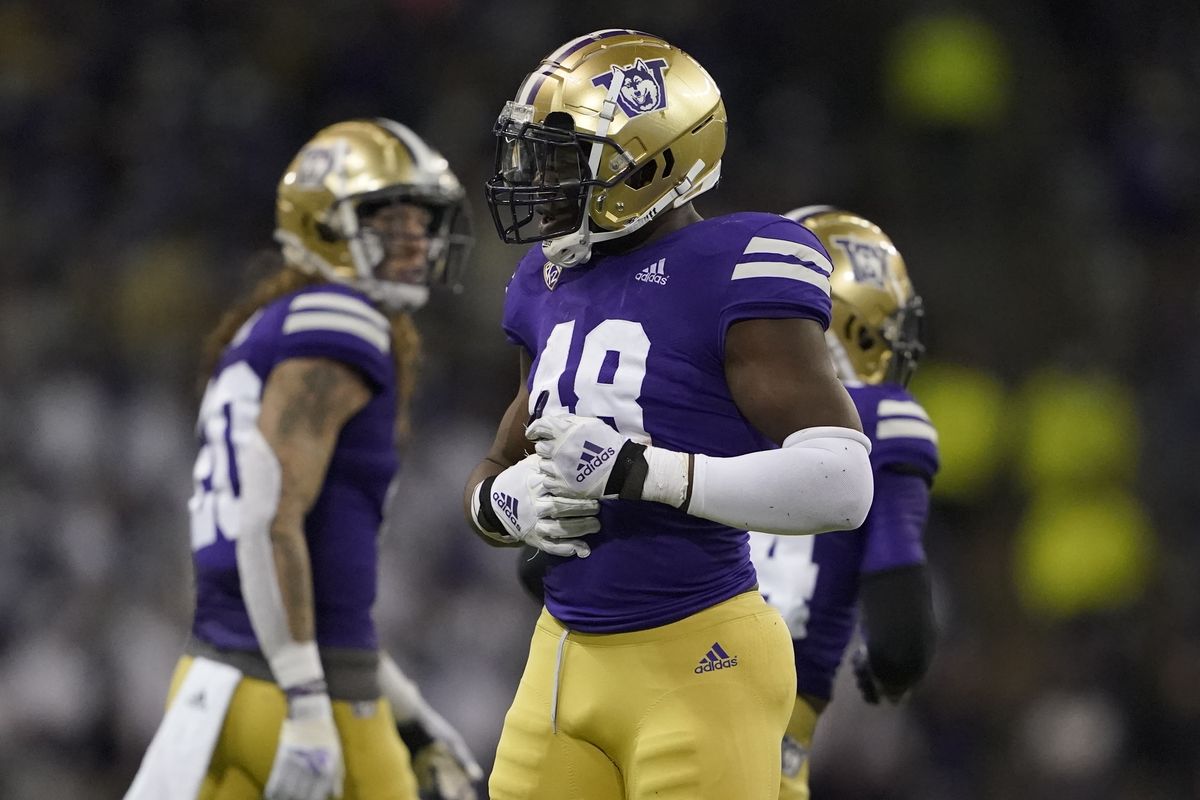 Washington linebacker Edefuan Ulofoshio (48) reacts to a play during the second half of an NCAA college football game against UCLA, Saturday, Oct. 16, 2021, in Seattle. UCLA won 24-17.  (Associated Press)
