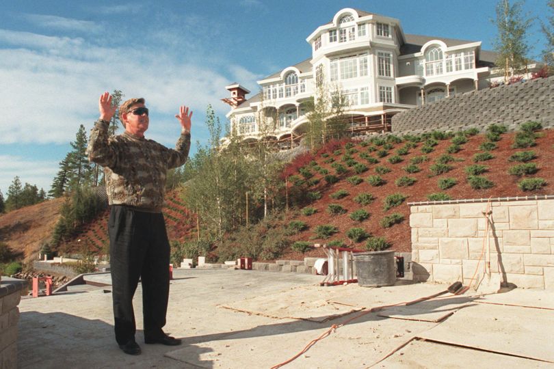 Ron Puryear envisions the completion of his 26,000-square-foot mansion along the Spokane River in Post Falls. Workers have spent nearly two years building the ``family compound,'' a vacation home for the Amway distributor. The job will last two more years.  Dan Pelle Photo