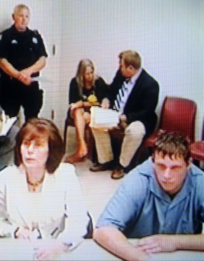 Robbie  Bishop ( front right ) appears via closed circuit video in the Superior Court of Judge Sam Cozza Monday August 24, 2009. CHRISTOPHER ANDERSON chrisa@spokesman.com (Christopher Anderson / The Spokesman-Review)