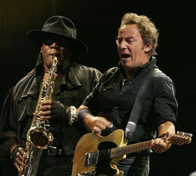 In this July 17, 2008 file photo, Bruce Springsteen, right, performs alongside Clarence Clemons on saxophone during a concert in Madrid. Clemons died June 18 at age 69. (Associated Press)
