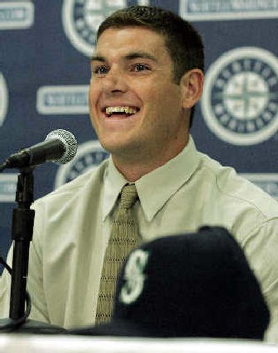
Jeff Clement smiles at reporters. 
 (Associated Press / The Spokesman-Review)