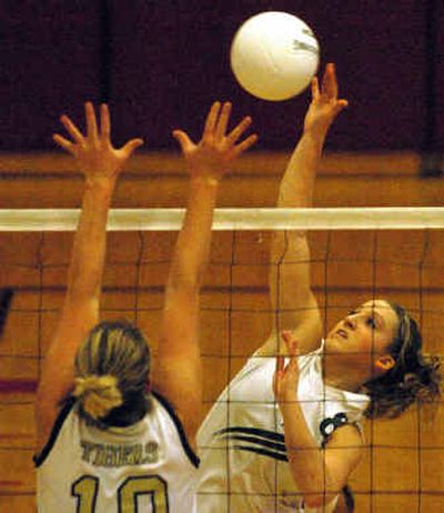 
Kristi Smith of St. Maries tries to get a spike past Timberlake's Corina Beyer (10) during the 3A District I volleyball championship match at NIC. 
 (Jesse Tinsley / The Spokesman-Review)