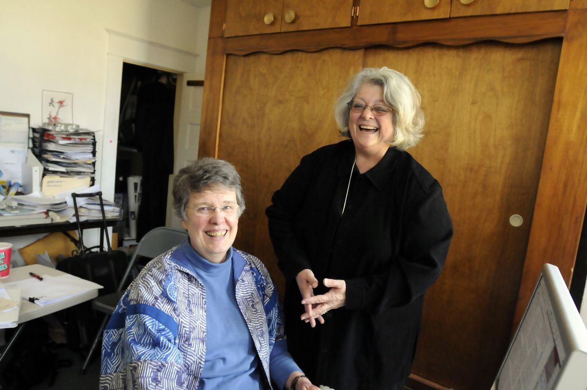Editor Mary Stamp, left, and associate editor Yvonne Lopez-Morton put out The Fig Tree, a free newspaper of religious news from the Spokane area. (Photos by Jesse Tinsley / The Spokesman-Review)