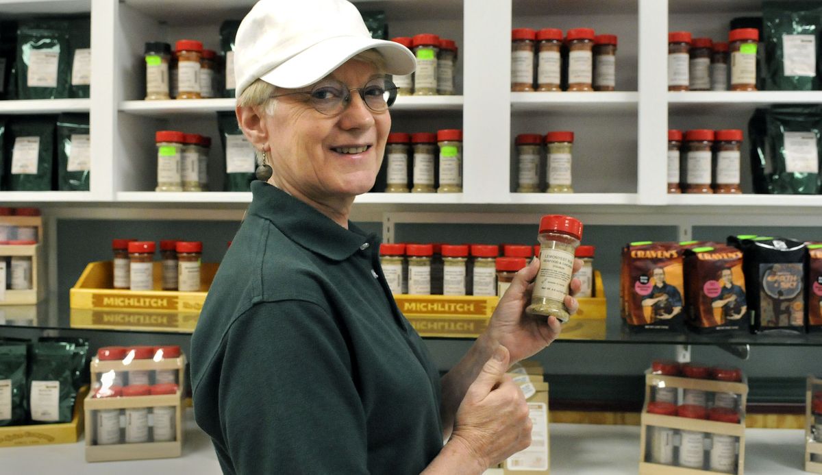 Joyce Bailey Vannoy, of Michlitch, offers many kinds of spices produced at her store at 130 N. Stone in Spokane. (Dan Pelle / The Spokesman-Review)