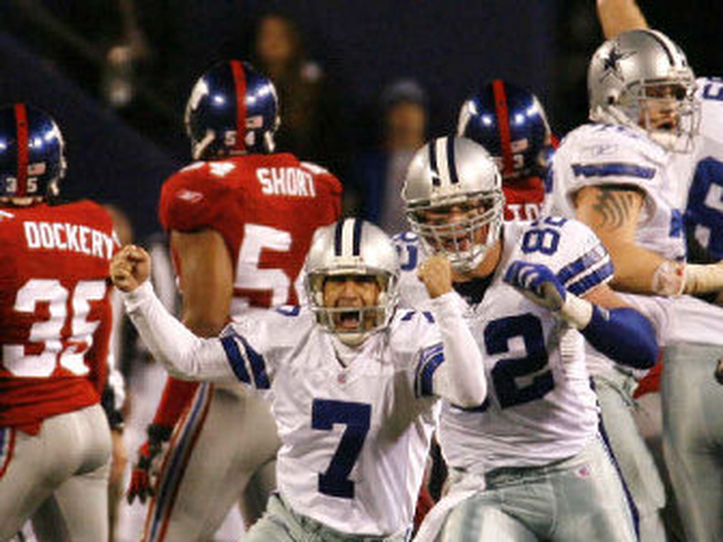 Dallas Cowboys Martin Gramatica and Jason Witten react after a 46 yard field  goal with 1 second left on the clock in the 4th quarter at Giants Stadium  in East Rutherford, New