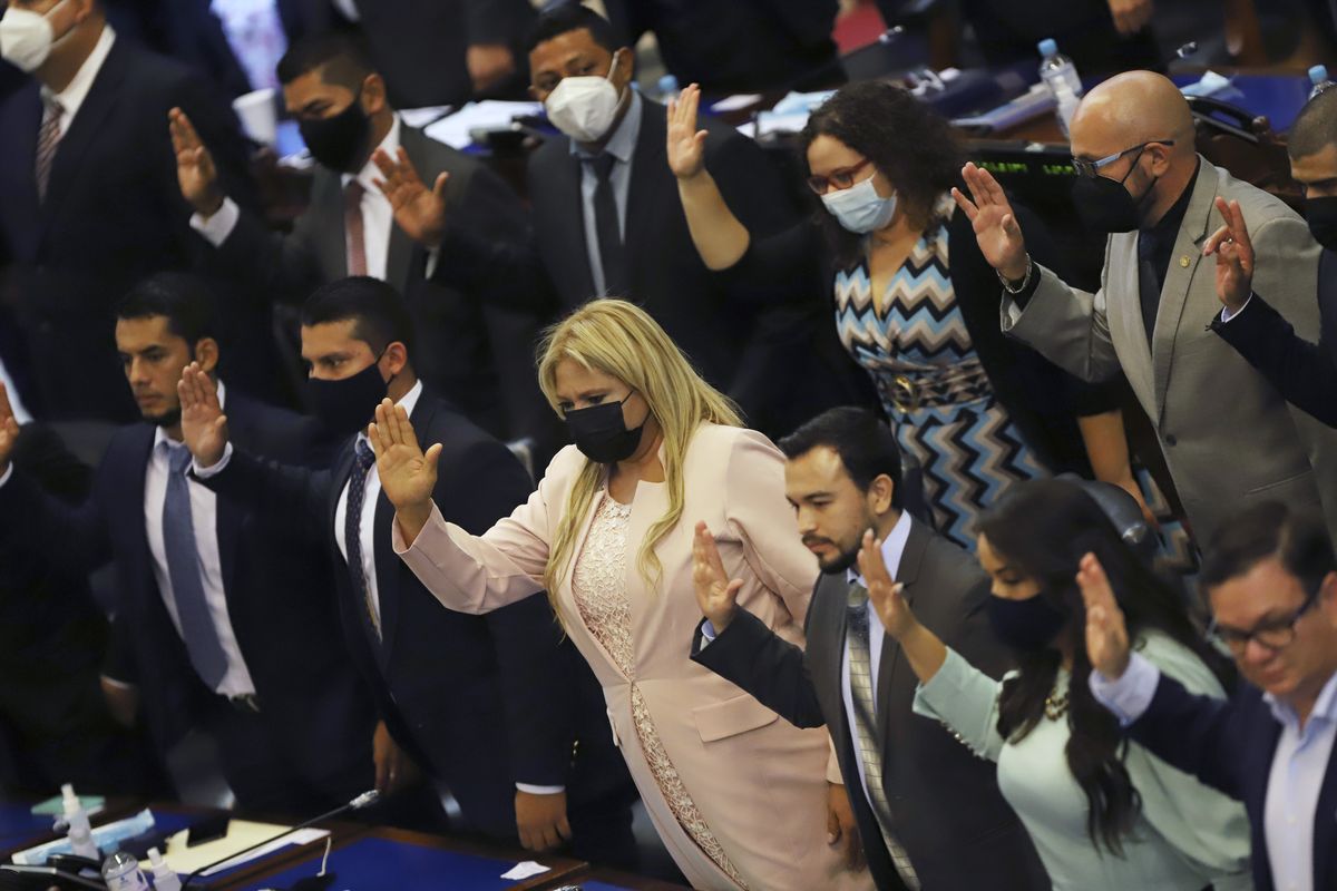 New members of the New Ideas party are sworn in during the Legislative Assembly in San Salvador, El Salvador, Saturday, May 1, 2021.  (Salvador Melendez)