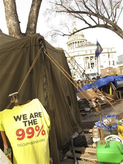 A part of the Occupy Boise encampment is shown near the Idaho Capitol in Boise, Idaho, on Monday, Feb. 27, 2012. A federal judge ruled that the tents, erected since November, can stay, but that sleeping and cooking at the site will no longer be allowed.  (John Miller / AP Photos)