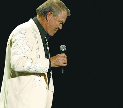 Glen Campbell during a performance at the 54th annual Grammy Awards on Feb. 12, 2012, in Los Angeles. Campbell will receive a lifetime achievement award at this year’s Grammys. (Associated Press)