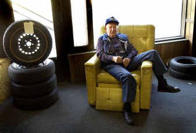 
Elmer Morlan, 87, relaxes in his Sprague Avenue tire shop where his business has helped keep the rubber on the road for area drivers for decades. 
 (Brian Plonka / The Spokesman-Review)