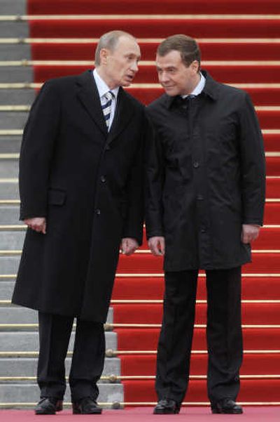 
President Medvedev shares a moment with his predecessor Vladimir Putin during the inauguration ceremony at the Kremlin in Moscow.
 (The Spokesman-Review)