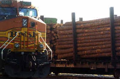 
Logs coming from Canada find their way into Spokane aboard a Burlington Northern train on Tuesday. 
 (Jed Conklin / The Spokesman-Review)
