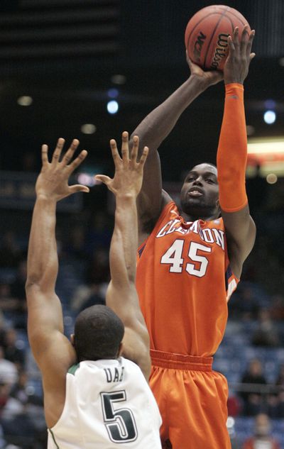 Clemson center Jerai Grant shoots over UAB guard Robert Williams during second-half action Tuesday night. (Associated Press)