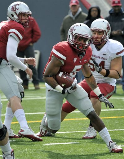 WSU redshirt freshman running back Rickey Galvin suffered a broken arm in the season opener last season and says the time on the sidelines helped him learn about timing with the offensive line. (Dan Pelle)