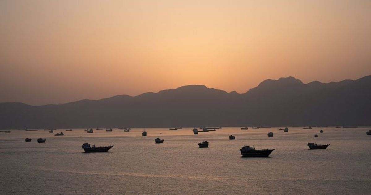Trump says U.S. to help ships stranded in Strait of Hormuz as tanker hit by projectiles