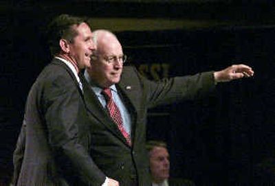 
Vice President Dick Cheney, right, and Washington state GOP gubernatorial candidate Dino Rossi greet the crowd gathered at a campaign luncheon in Kennewick on Monday.
 (Associated Press / The Spokesman-Review)