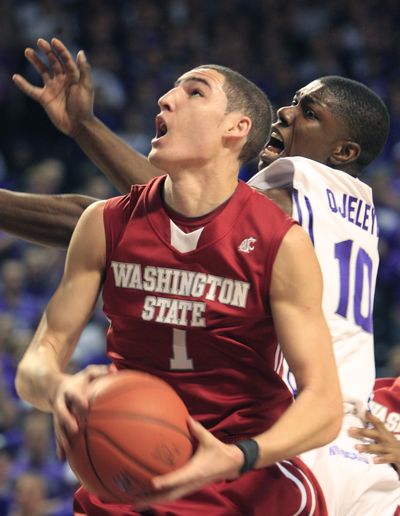 Washington State guard Klay Thompson shoots while covered by Kansas State forward Victor Ojeleye last weekend.   (Associated Press)