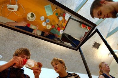 
Barker High School junior Phil Butcher, left, learns about measurements Thursday from WSU extension teacher Karin Gilchrist. The students are learning nutrition and food preparation as part of a USDA-funded program to promote healthy eating. 
 (Brian Plonka / The Spokesman-Review)