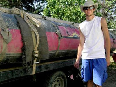 
Billy Cotton stands next to a raft on the Missouri River in Great Falls.
 (Photos courtesy of Billy Cotton / The Spokesman-Review)